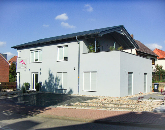 Neubau eines Wohn- und Geschäftshauses